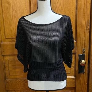 Black knit blouse.
